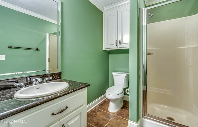 bathroom with toilet, tile patterned flooring, crown molding, vanity, and an enclosed shower