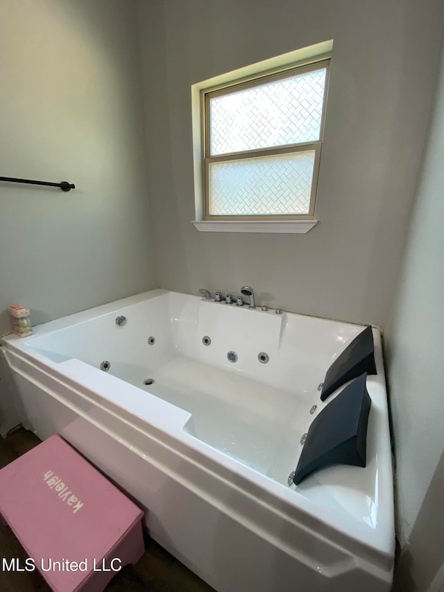 bathroom with a bath