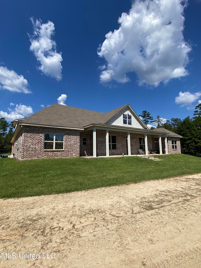 view of front of home with a front yard