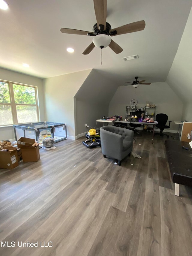 bonus room featuring ceiling fan, wood-type flooring, and vaulted ceiling