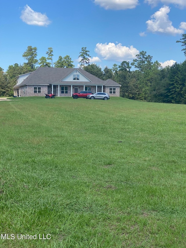 view of front of house with a front lawn