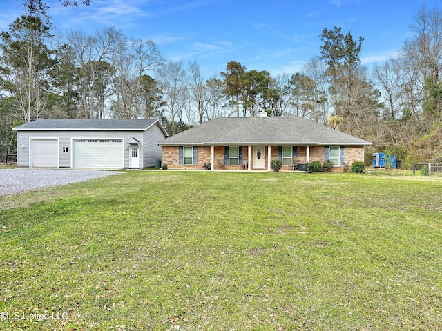 single story home with brick siding and a front yard