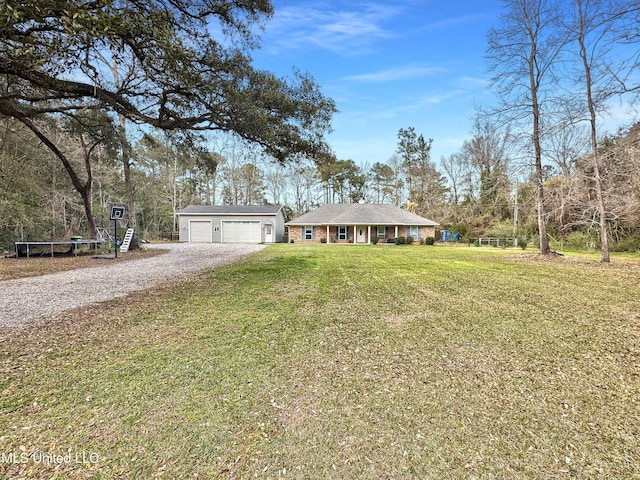 view of front of house with a garage, a front lawn, and brick siding