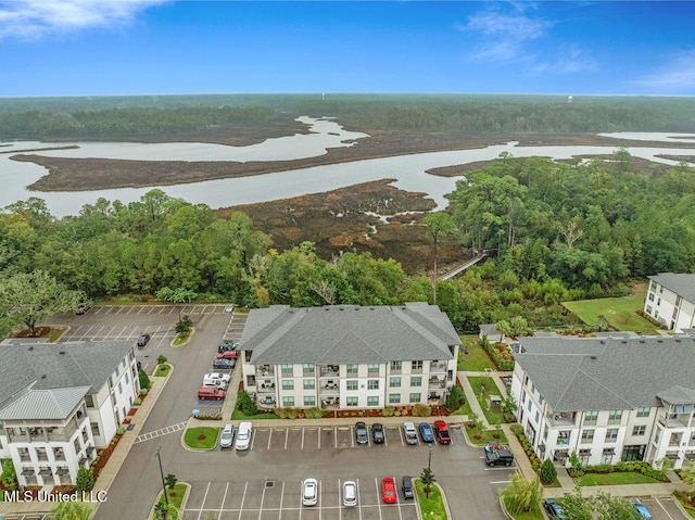 drone / aerial view with a water view