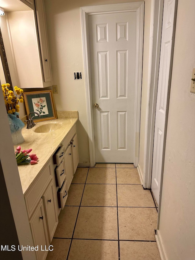 bathroom with vanity and tile patterned floors