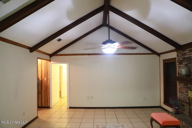 unfurnished living room featuring lofted ceiling with beams, a brick fireplace, light tile patterned floors, and ceiling fan