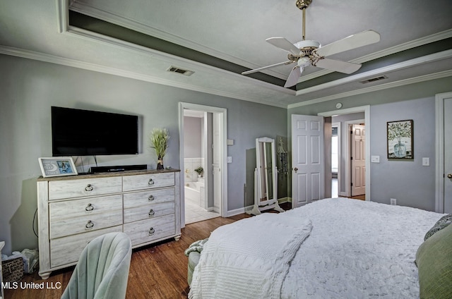 506 Ridge Cir, Brandon, MS 39047 - bedroom with a raised ceiling, dark wood finished floors, ornamental molding, ensuite bathroom, and a ceiling fan