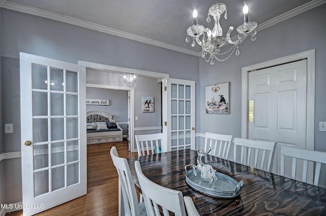 506 Ridge Cir, Brandon, MS 39047 - dining room featuring a chandelier, ornamental molding, and dark wood-type flooring