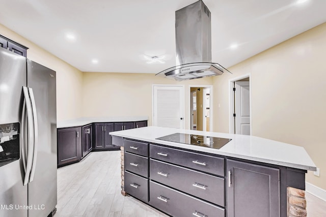 kitchen featuring a center island, stainless steel fridge with ice dispenser, island exhaust hood, light hardwood / wood-style floors, and black electric cooktop