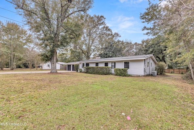 single story home featuring central AC unit and a front yard