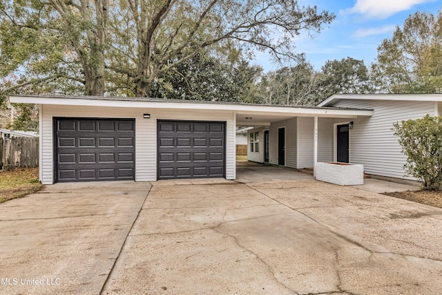 view of front facade with a carport