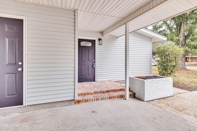 entrance to property with a porch