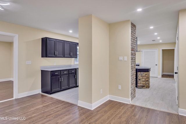 hallway with light wood-type flooring