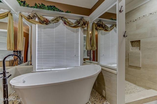 bathroom with independent shower and bath and ornamental molding