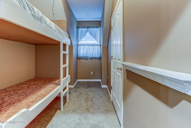 bedroom featuring light colored carpet