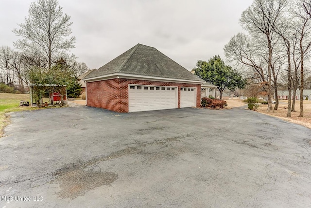 view of home's exterior with a garage