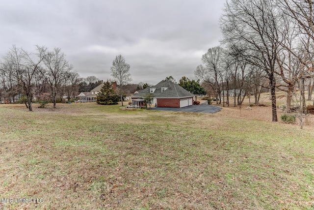 view of yard with a garage