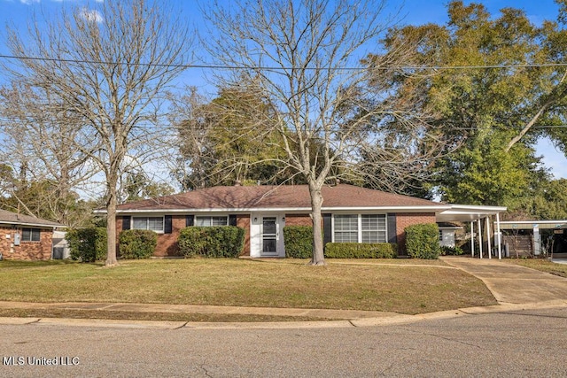 ranch-style house with a carport and a front lawn