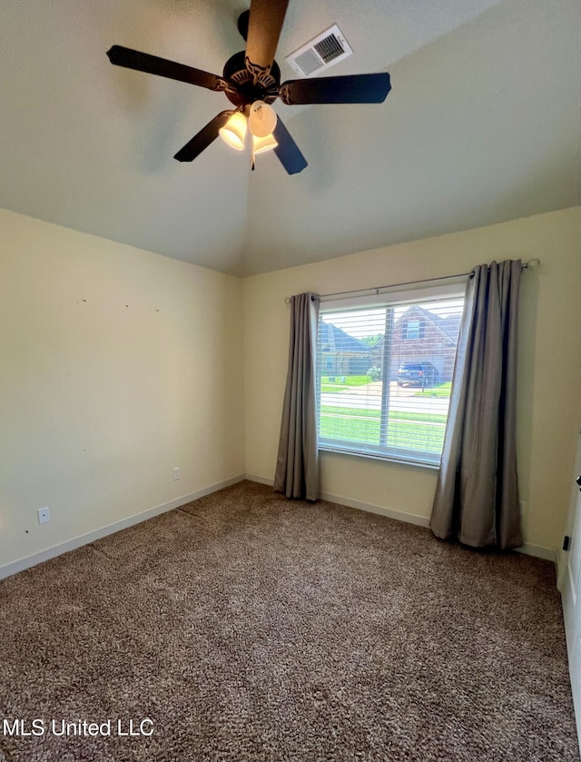 1164 Chestnut Dr, Southaven, MS 38671 - spare room featuring carpet floors, a ceiling fan, and vaulted ceiling
