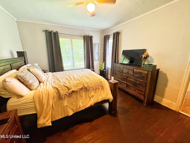 340 Elm Ave, Clarksdale, MS 38614 - bedroom featuring dark wood-style floors, ornamental molding, baseboards, and a ceiling fan