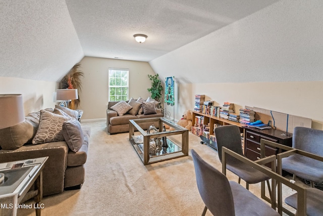 8436 Ansley Park Ln, Southaven, MS 38672 - living room with a textured ceiling, carpet, and lofted ceiling