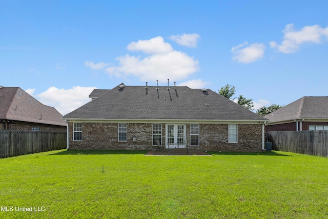 8436 Ansley Park Ln, Southaven, MS 38672 - back of property featuring a fenced backyard, a patio area, and brick siding
