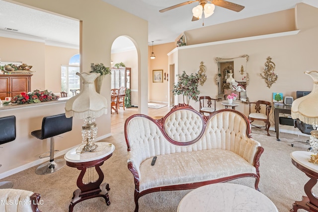 8436 Ansley Park Ln, Southaven, MS 38672 - carpeted living area with a ceiling fan and arched walkways