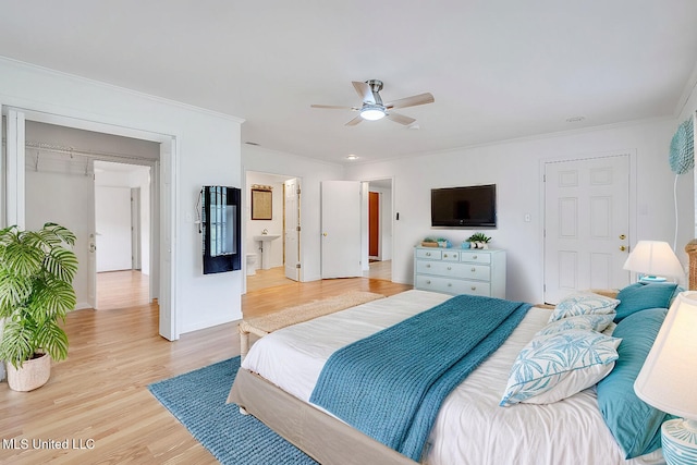 216 Buena Vista Dr, Long Beach, MS 39560 - bedroom with baseboards, ornamental molding, ceiling fan, and light wood-style floors