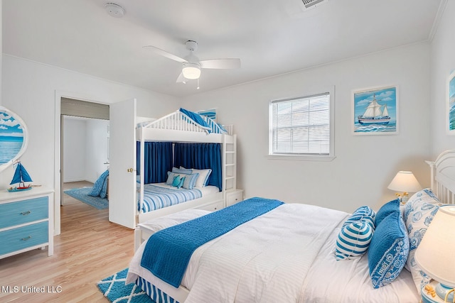 216 Buena Vista Dr, Long Beach, MS 39560 - bedroom featuring a ceiling fan, visible vents, and light wood-style floors