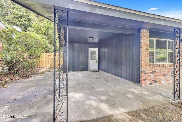 216 Buena Vista Dr, Long Beach, MS 39560 - exterior space with fence and a carport