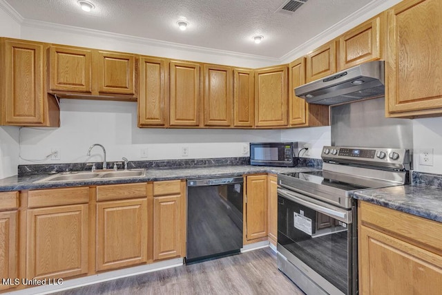 216 Buena Vista Dr, Long Beach, MS 39560 - kitchen with a sink, dark countertops, visible vents, under cabinet range hood, and black appliances