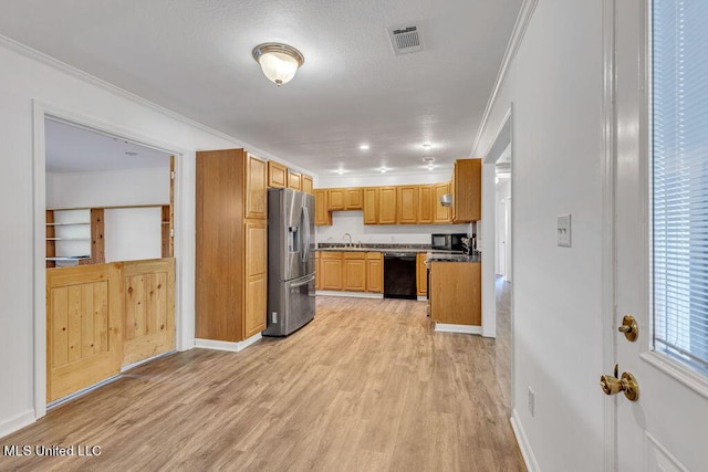 216 Buena Vista Dr, Long Beach, MS 39560 - kitchen featuring a sink, light wood-type flooring, crown molding, black appliances, and visible vents
