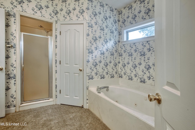 full bathroom featuring a stall shower, wallpapered walls, and a tub with jets