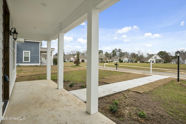 view of patio / terrace with a residential view