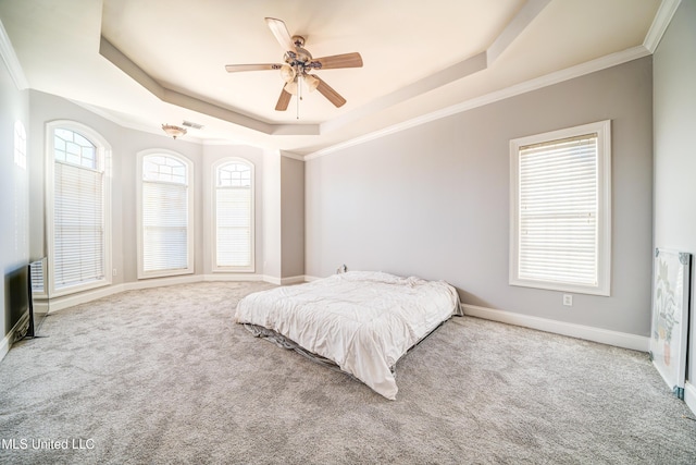 9480 Miranda Dr, Olive Branch, MS 38654 - bedroom featuring a tray ceiling, carpet, ornamental molding, and ceiling fan