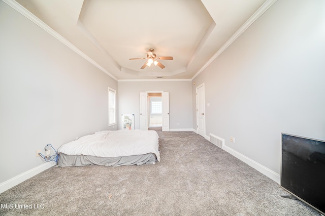 9480 Miranda Dr, Olive Branch, MS 38654 - carpeted bedroom with a raised ceiling, a ceiling fan, and crown molding