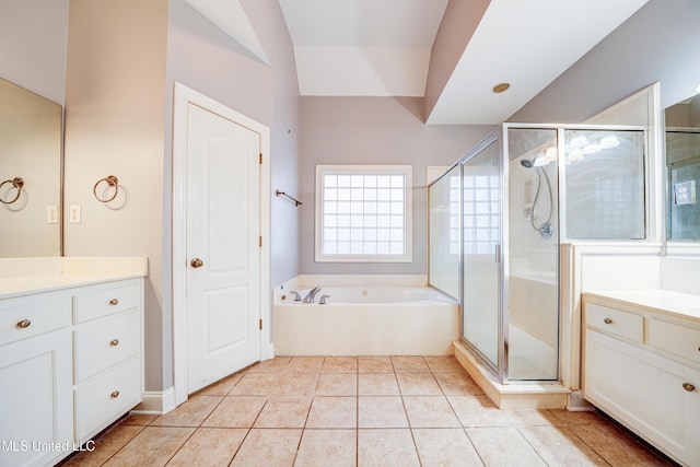9480 Miranda Dr, Olive Branch, MS 38654 - bathroom with vanity, a bath, a shower stall, and tile patterned floors