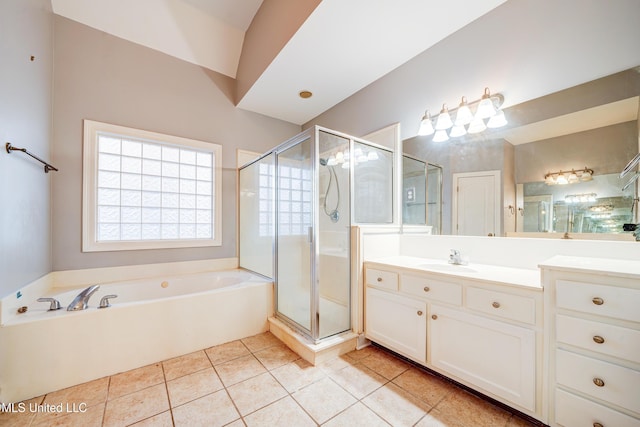 9480 Miranda Dr, Olive Branch, MS 38654 - full bath featuring a bath, vanity, a shower stall, and tile patterned flooring