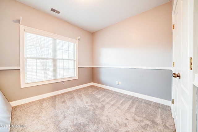 9480 Miranda Dr, Olive Branch, MS 38654 - carpeted spare room with baseboards