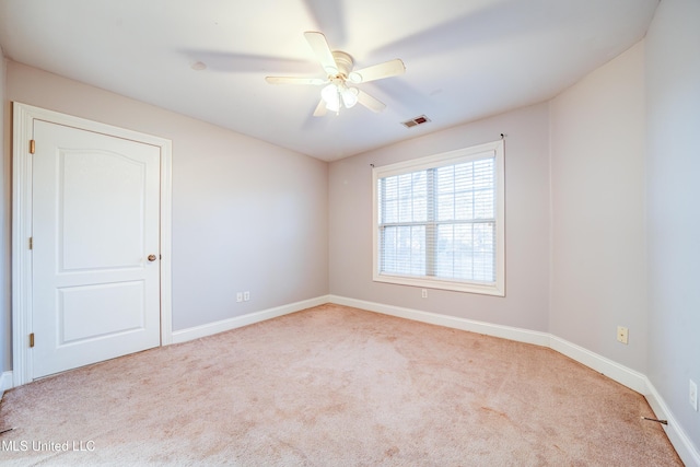 9480 Miranda Dr, Olive Branch, MS 38654 - empty room with carpet floors and ceiling fan