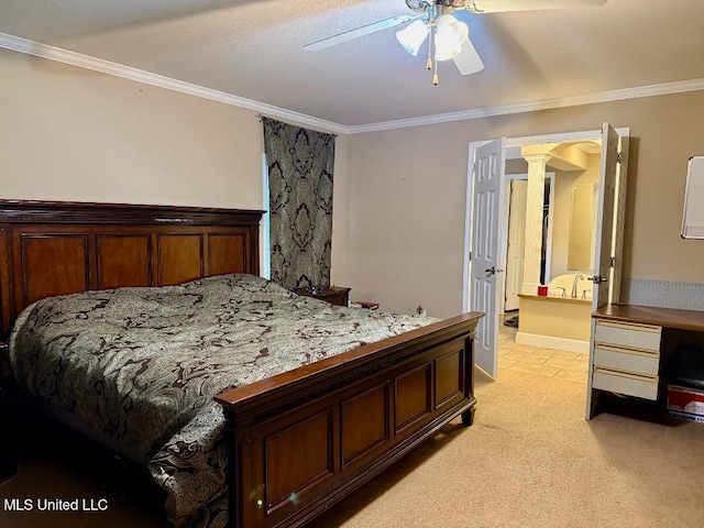 carpeted bedroom with ceiling fan, ornamental molding, and decorative columns