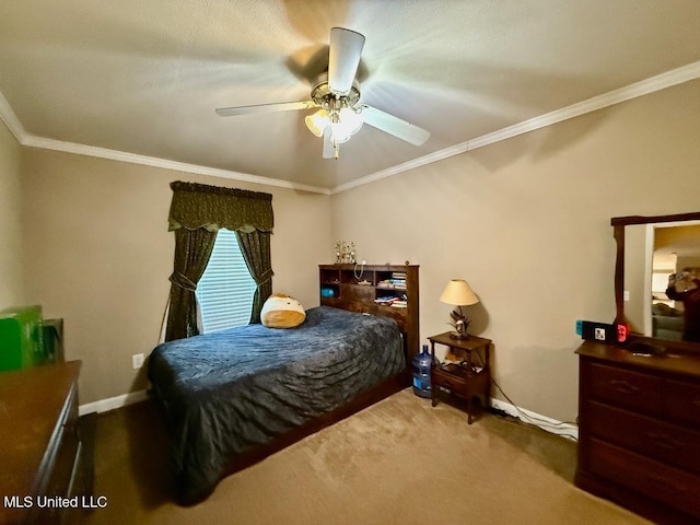 carpeted bedroom featuring ceiling fan and ornamental molding