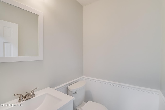 bathroom featuring sink and toilet