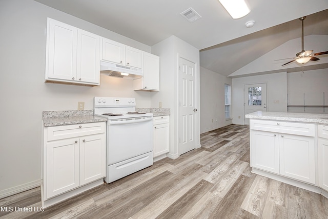 kitchen with vaulted ceiling, white electric range oven, and white cabinets