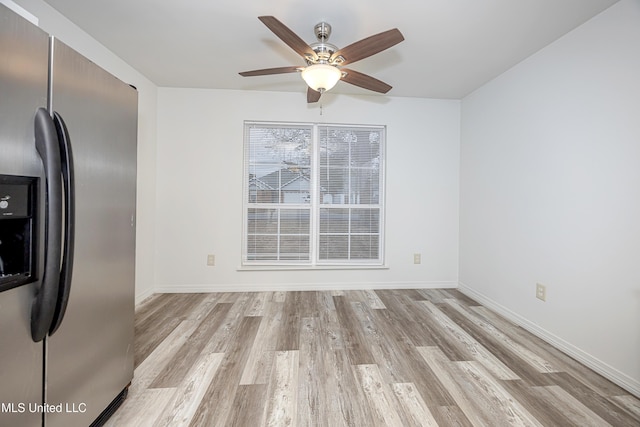 interior space with light hardwood / wood-style flooring and ceiling fan