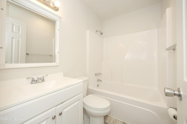 full bathroom featuring vanity, toilet, and tub / shower combination