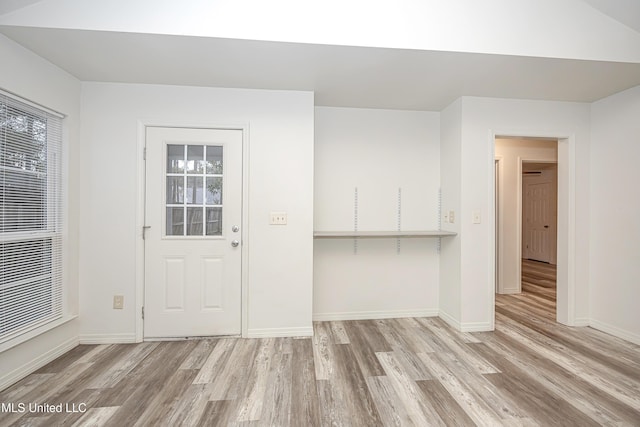 entrance foyer with light hardwood / wood-style floors