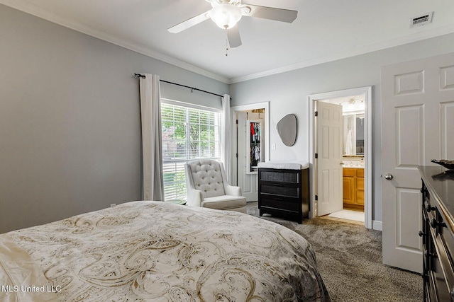 118 Armand Oaks, Ocean Springs, MS 39564 - bedroom with carpet floors, crown molding, connected bathroom, a ceiling fan, and a spacious closet