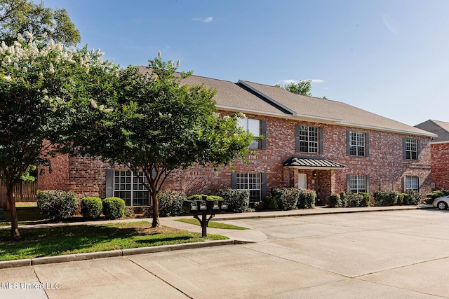 118 Armand Oaks, Ocean Springs, MS 39564 - view of front of home with brick siding