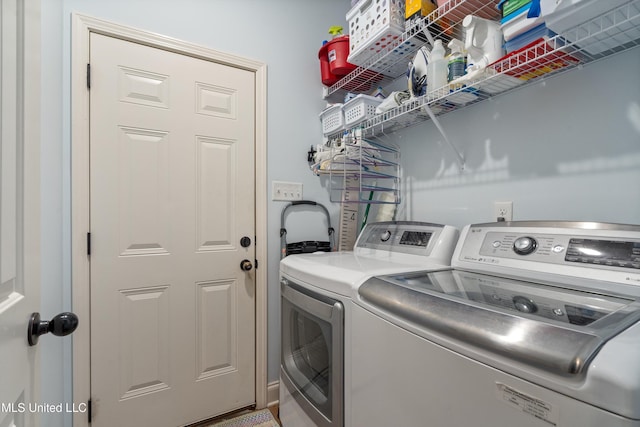 laundry room with separate washer and dryer